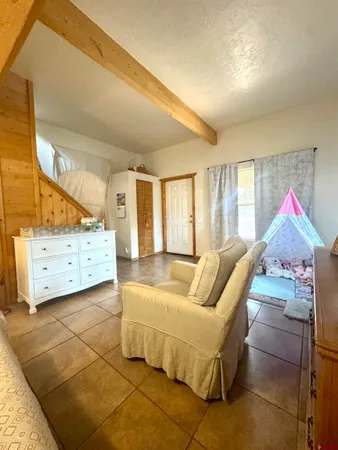 a view of livingroom with furniture