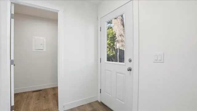 a view of an entryway with window