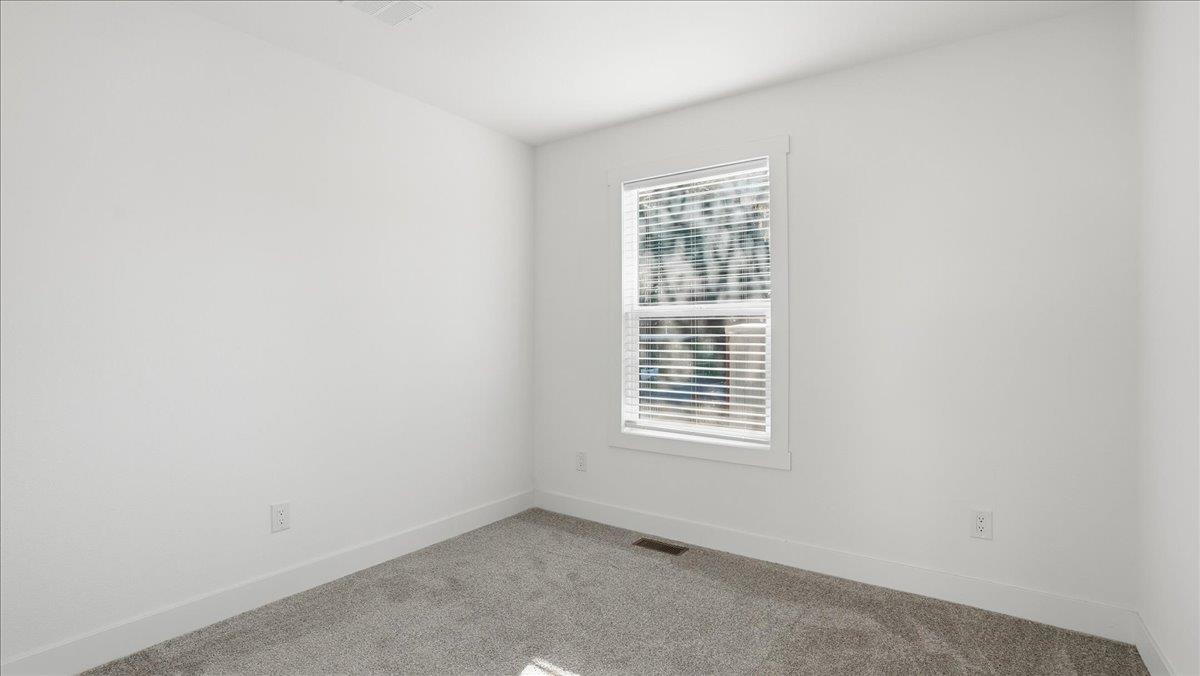 135 Ponderosa Way, Unit 14 Colfax, CA 95713 - Photo 19 of 37 an empty room with a window