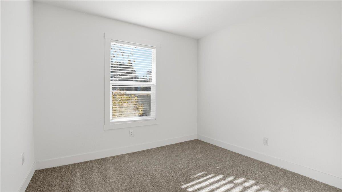 135 Ponderosa Way, Unit 14 Colfax, CA 95713 - Photo 23 of 37 a view of an empty room with a window