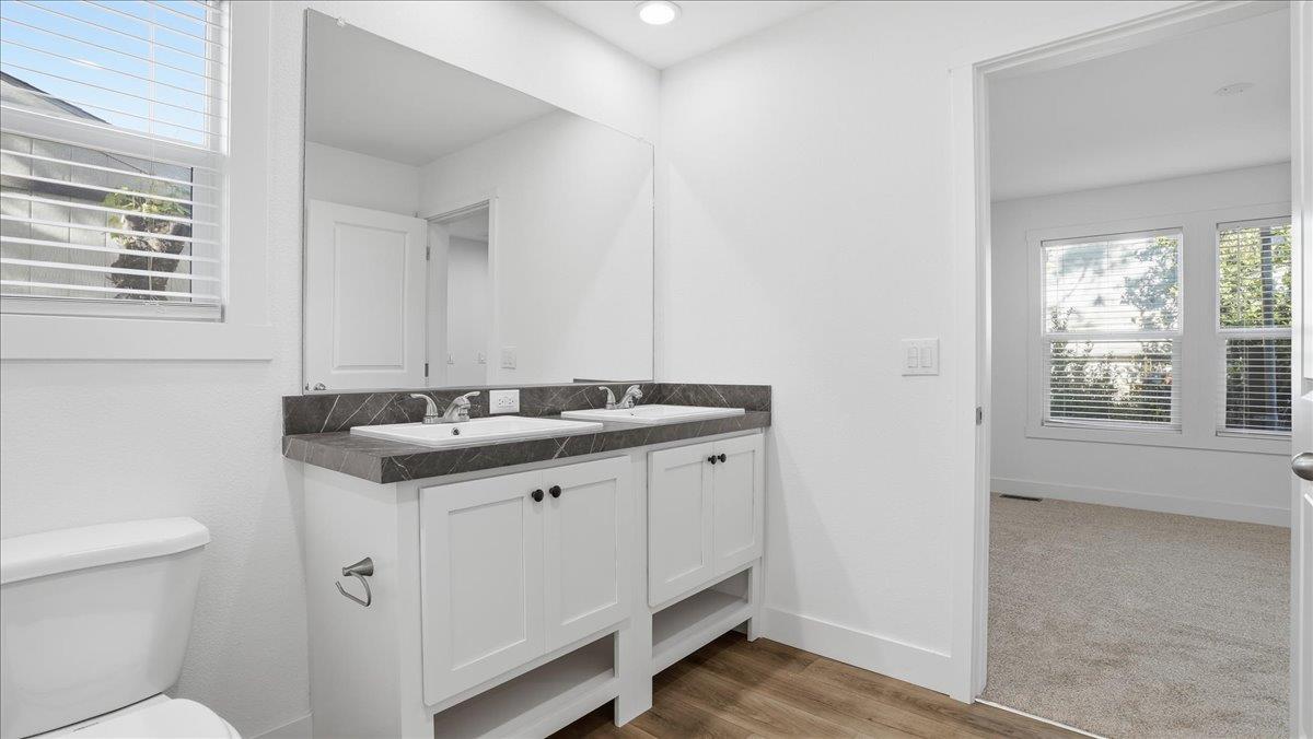 135 Ponderosa Way, Unit 14 Colfax, CA 95713 - Photo 30 of 37 a bathroom with a sink and a toilet