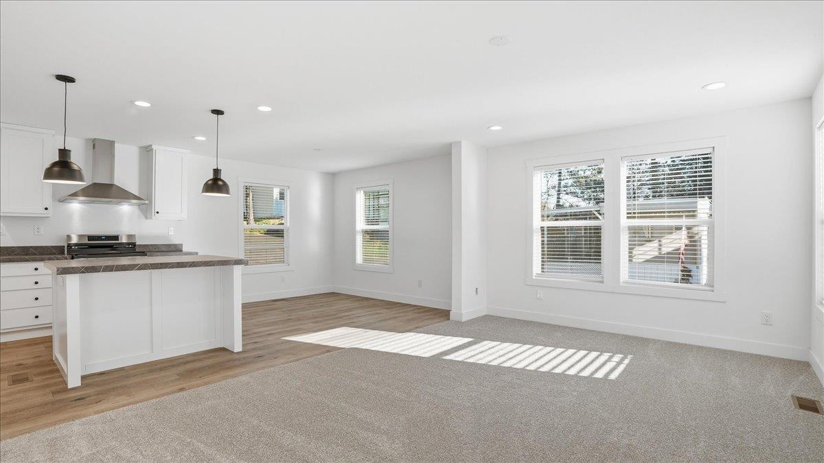 135 Ponderosa Way, Unit 14 Colfax, CA 95713 - Photo 6 of 37 a view of kitchen with windows and ceiling fan