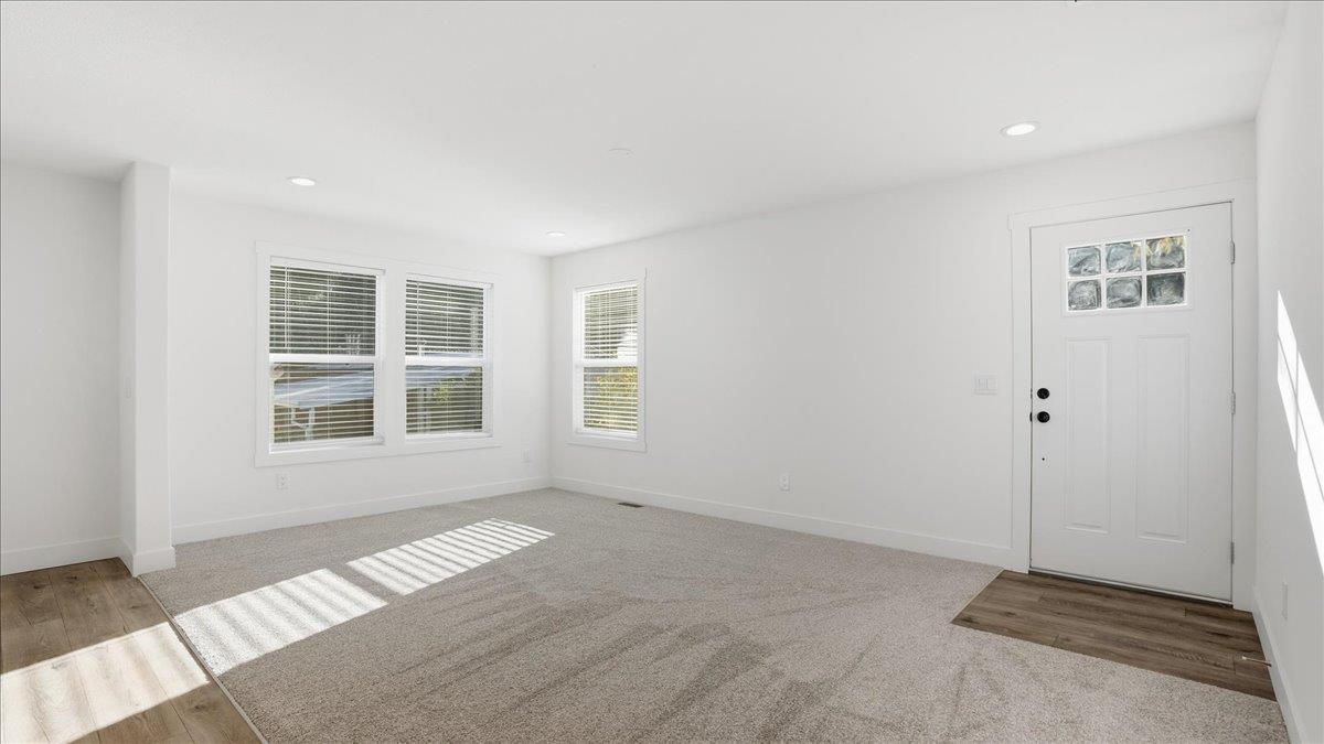 135 Ponderosa Way, Unit 14 Colfax, CA 95713 - Photo 8 of 37 a view of an empty room with a window