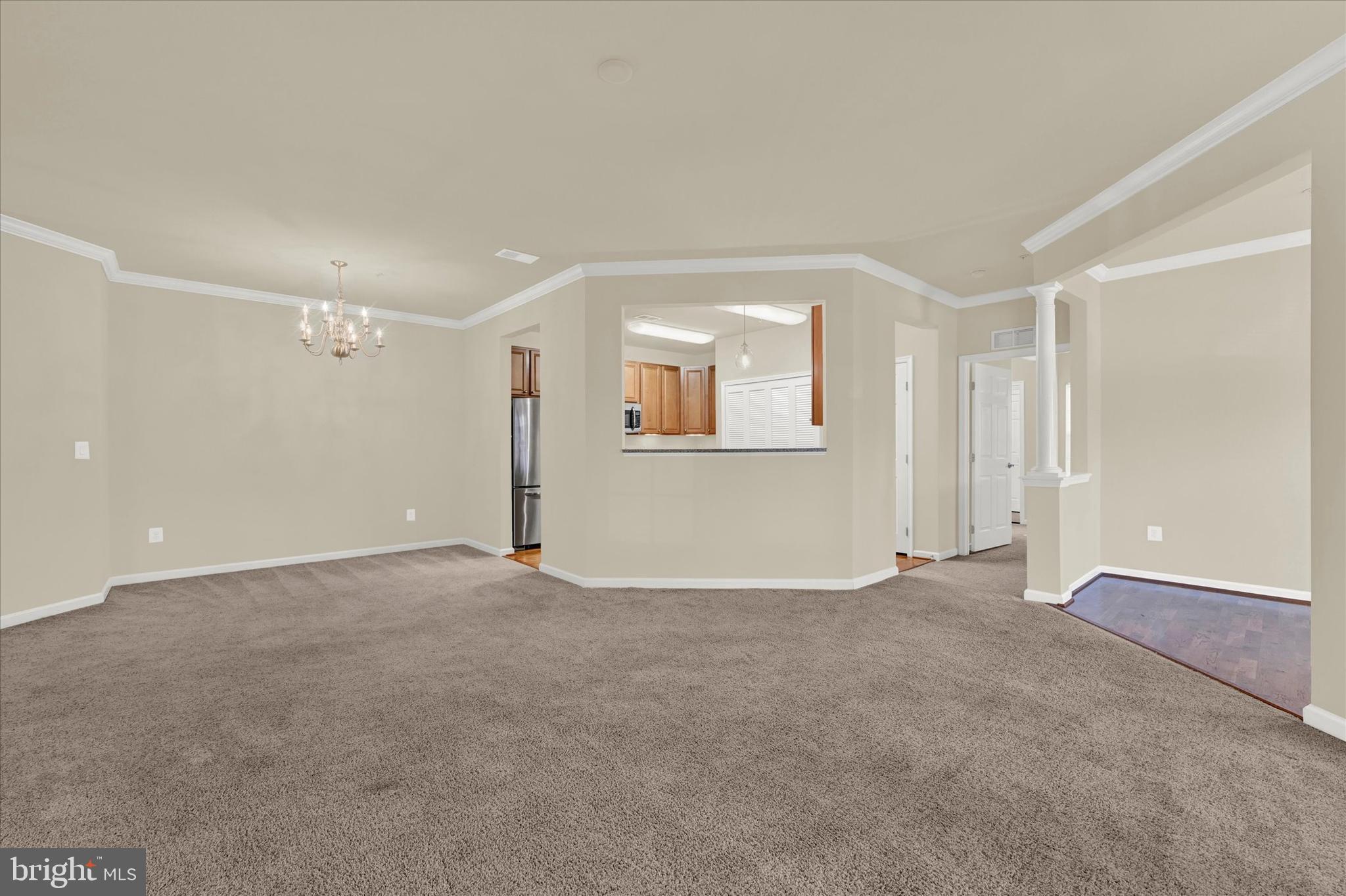 8440 Ice Crystal Drive, Unit D Laurel, MD 20723 - Photo 3 of 18 Living and dining area