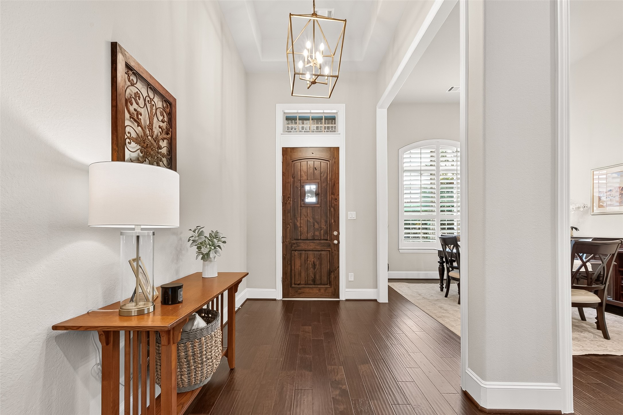 2803 Mayfield Ridge Lane Katy, TX 77494 - Photo 5 of 40 Rich wood floors, designer lighting and tall tray ceilings greet you when you walk into this masterpiece!