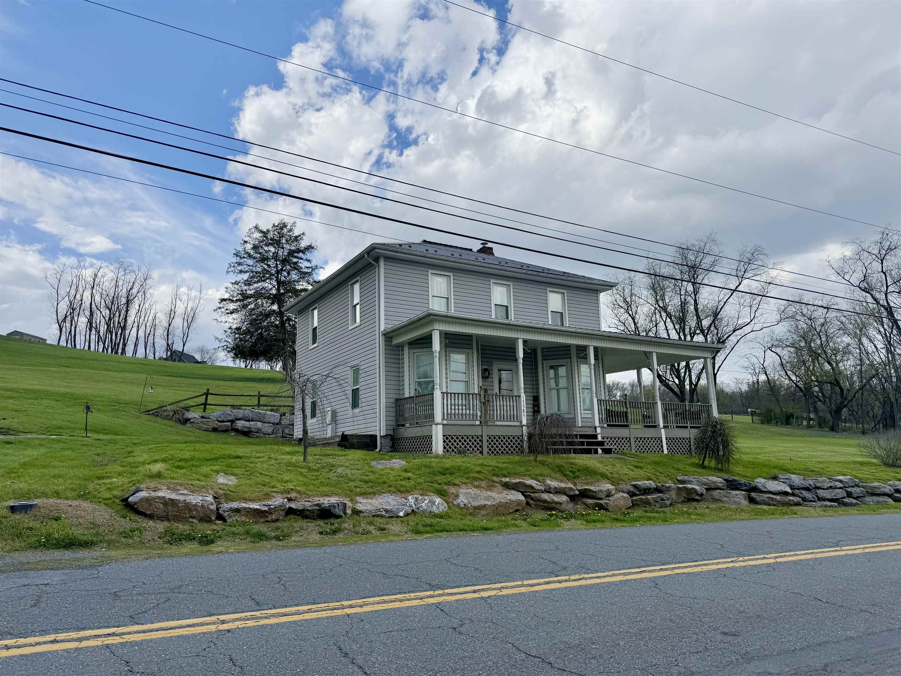 15385 Evergreen Valley Road Timberville, VA 22853 - Photo 35 of 44 a front view of a house with a yard