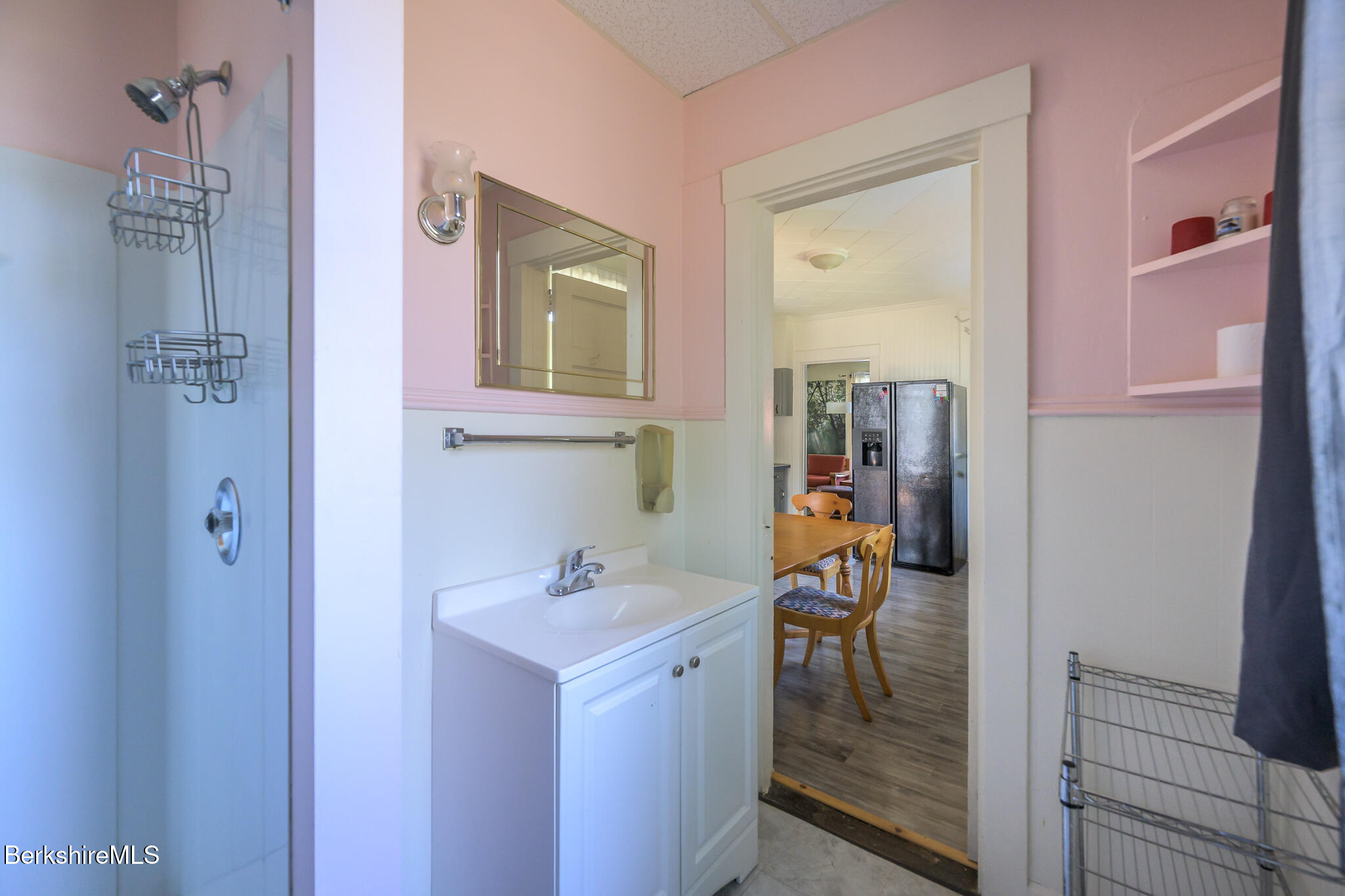 6 East Street Stockbridge, MA 01262 - Photo 15 of 23 a bathroom with a sink a mirror and a window