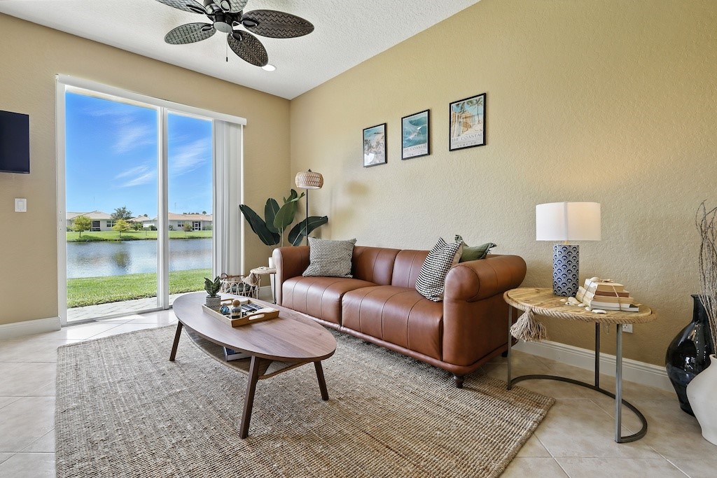 263 Provence Place Vero Beach, FL 32960 - Photo 4 of 33 a living room with furniture and a large window
