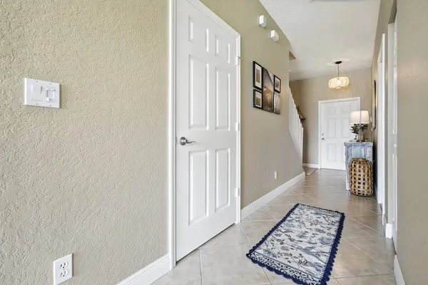 a view of a hallway with windows
