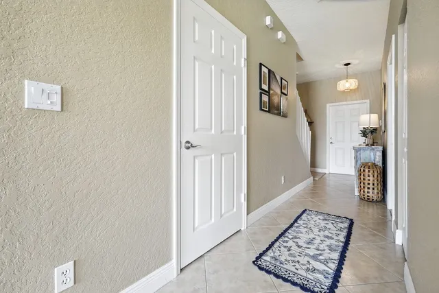 a view of a hallway with windows