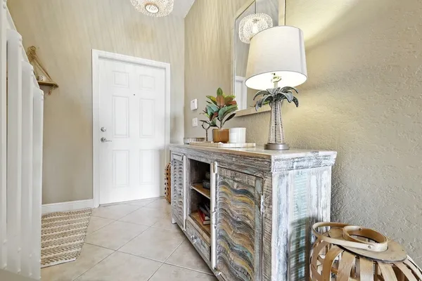 a view of a hallway with washer and dryer