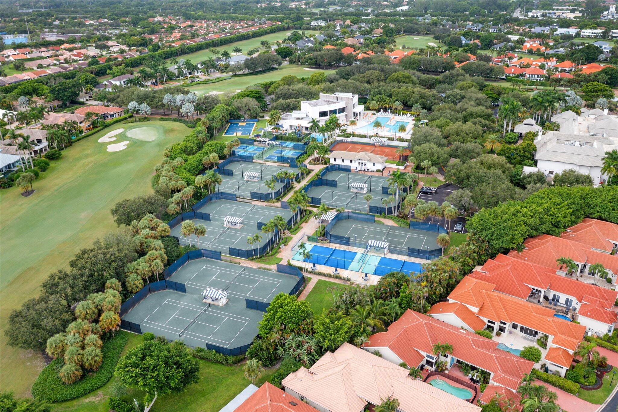 7081 Mallorca Crescent Boca Raton, FL 33433 - Photo 24 of 26 an aerial view of residential houses with outdoor space and trees
