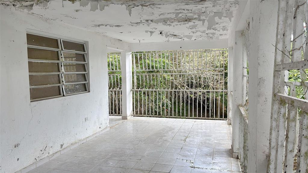 730 Carr Km Cayey, Cayey 00736 - Photo 3 of 17 a view of a room with wooden floor and windows