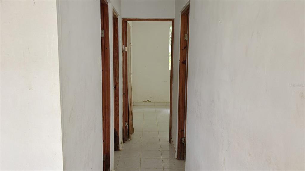 730 Carr Km Cayey, Cayey 00736 - Photo 7 of 17 a view of a bathroom from a hallway