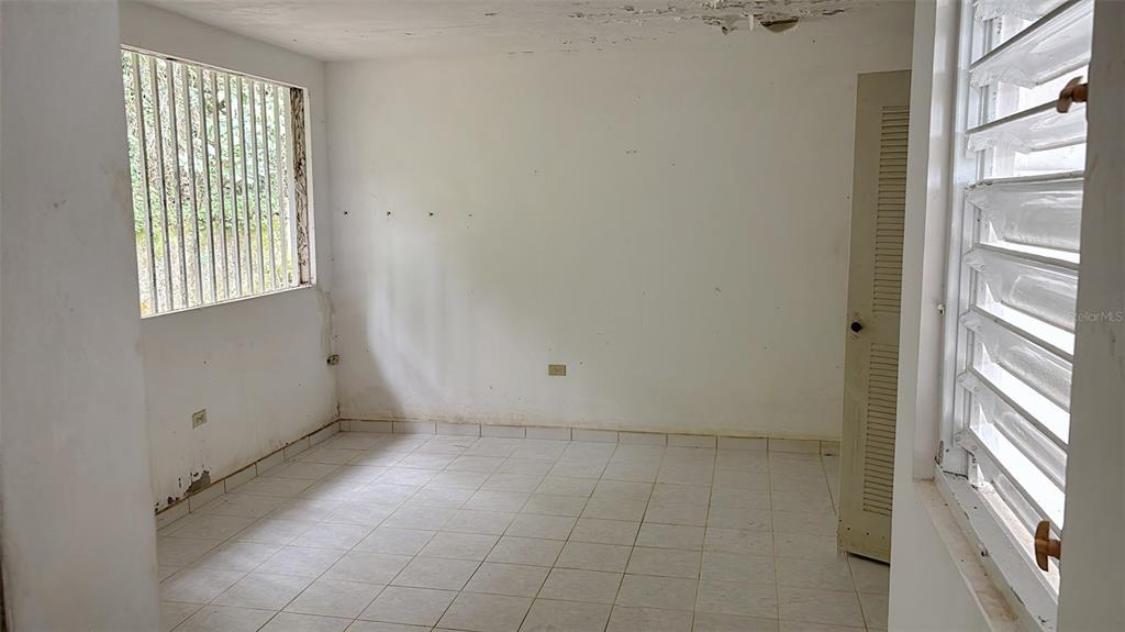730 Carr Km Cayey, Cayey 00736 - Photo 9 of 17 a view of an empty room with a window