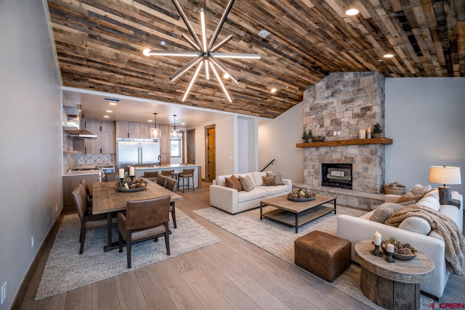95 Travertine Trail Durango, CO 81301 - Photo 3 of 41 a living room with furniture and a fireplace