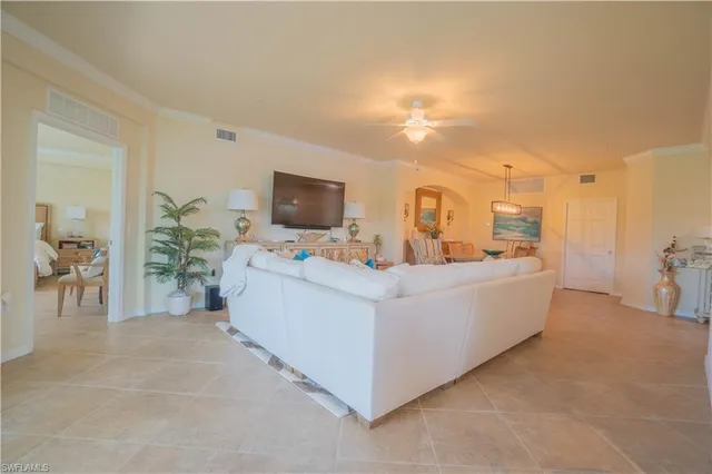 a view of a livingroom with furniture and window