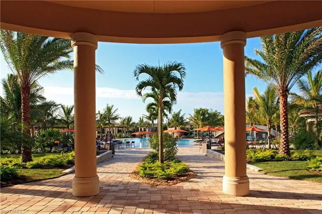a view of a living room and a wooden floor