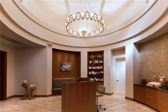 a view of swimming pool with outdoor seating and plants
