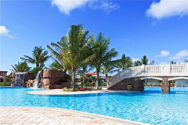 an outdoor space with furniture and umbrella