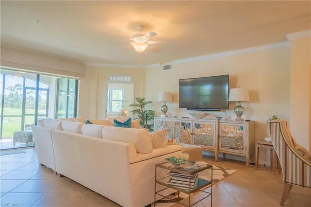 a kitchen with stainless steel appliances granite countertop a stove top oven a sink dishwasher a refrigerator and a microwave