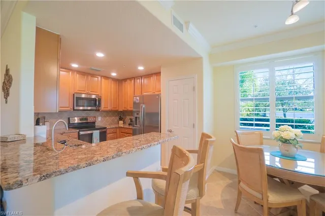 a view of a dining room with furniture