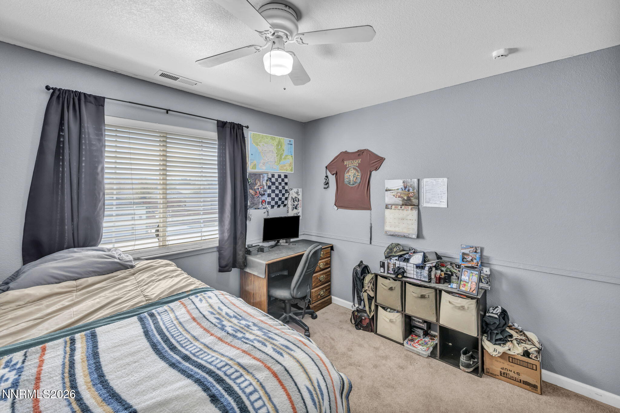 17615 Baileyville Court Reno, NV 89508 - Photo 12 of 19 a bedroom with furniture and a window