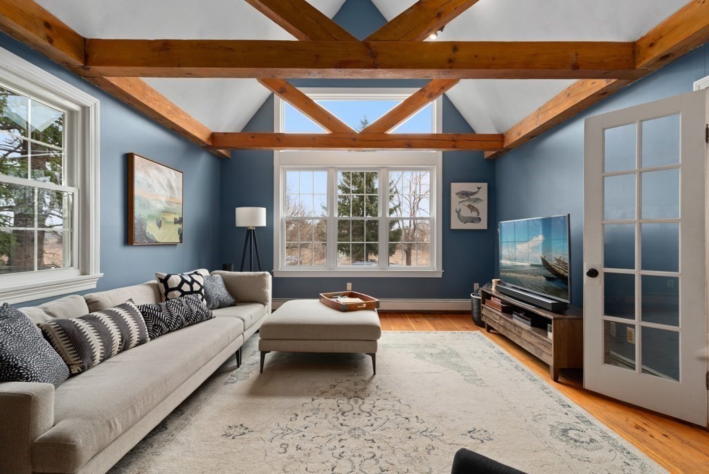 15 Scotland Road Newbury, MA 01951 - Photo 2 of 34 a living room with furniture and a flat screen tv
