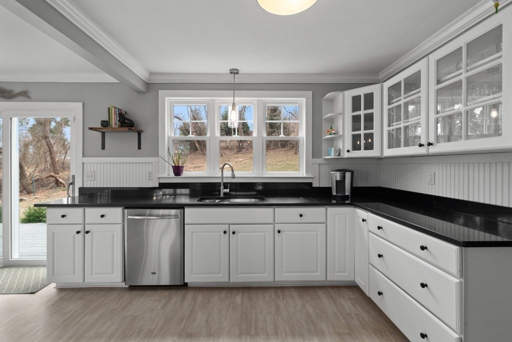 15 Scotland Road Newbury, MA 01951 - Photo 9 of 34 a kitchen with granite countertop a sink and cabinets