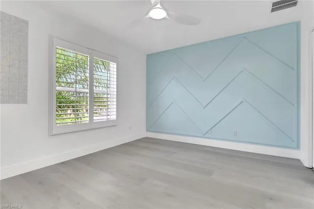 an empty room with a window