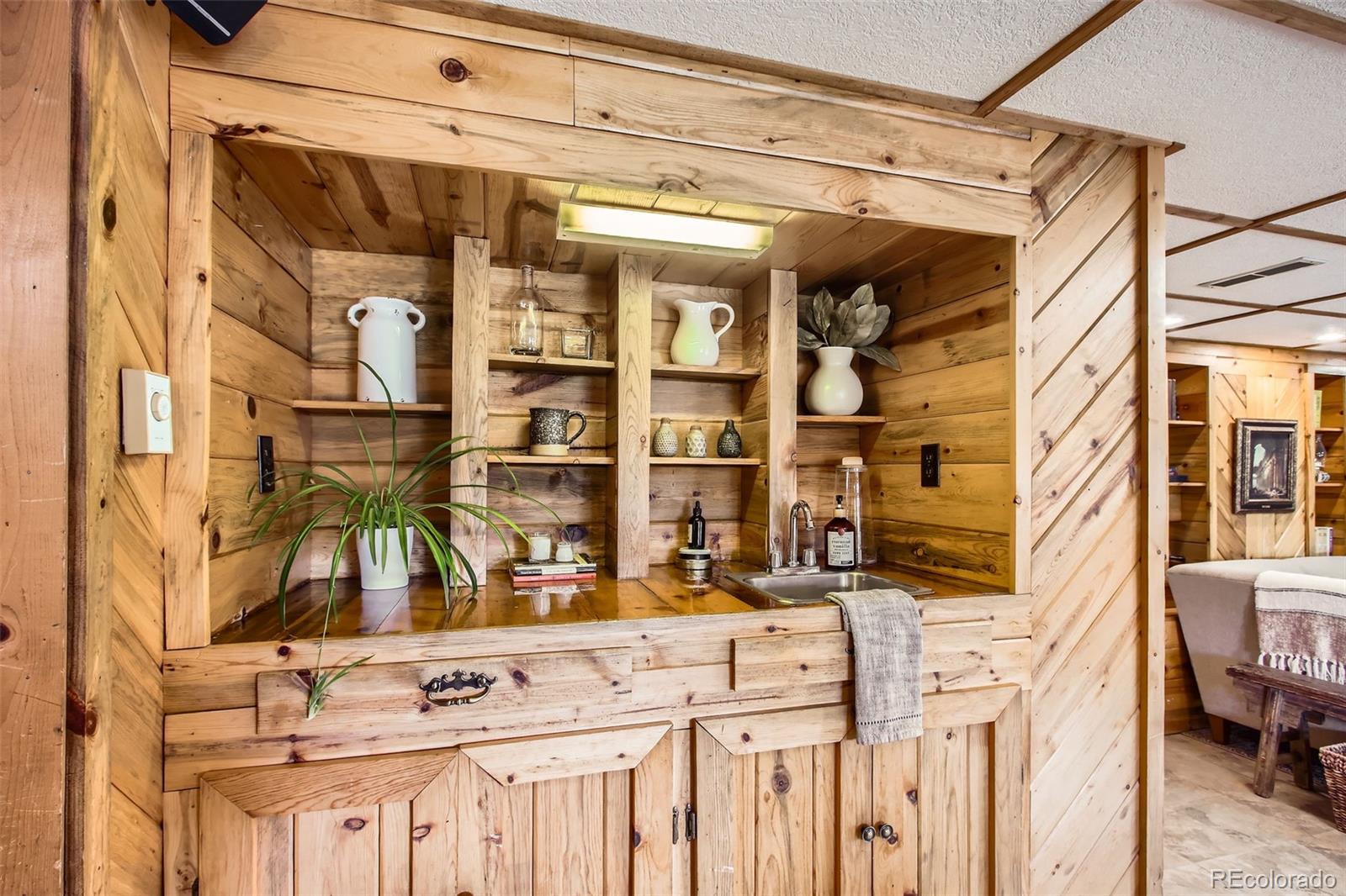 16626 Ouray Road West Pine, CO 80470 - Photo 22 of 50 a front view of a building with multiple windows