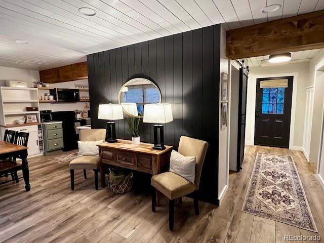 16626 Ouray Road West Pine, CO 80470 - Photo 28 of 50 a living room with furniture and a wooden floor
