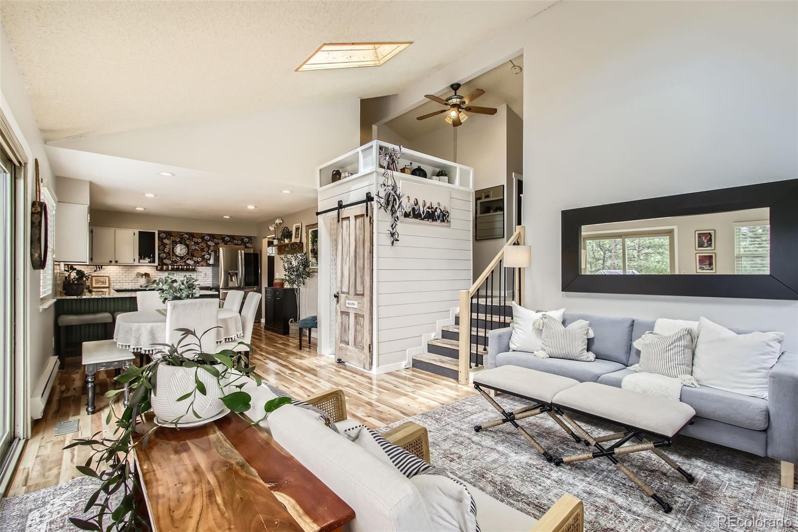16626 Ouray Road West Pine, CO 80470 - Photo 3 of 50 a living room with furniture and a wooden floor