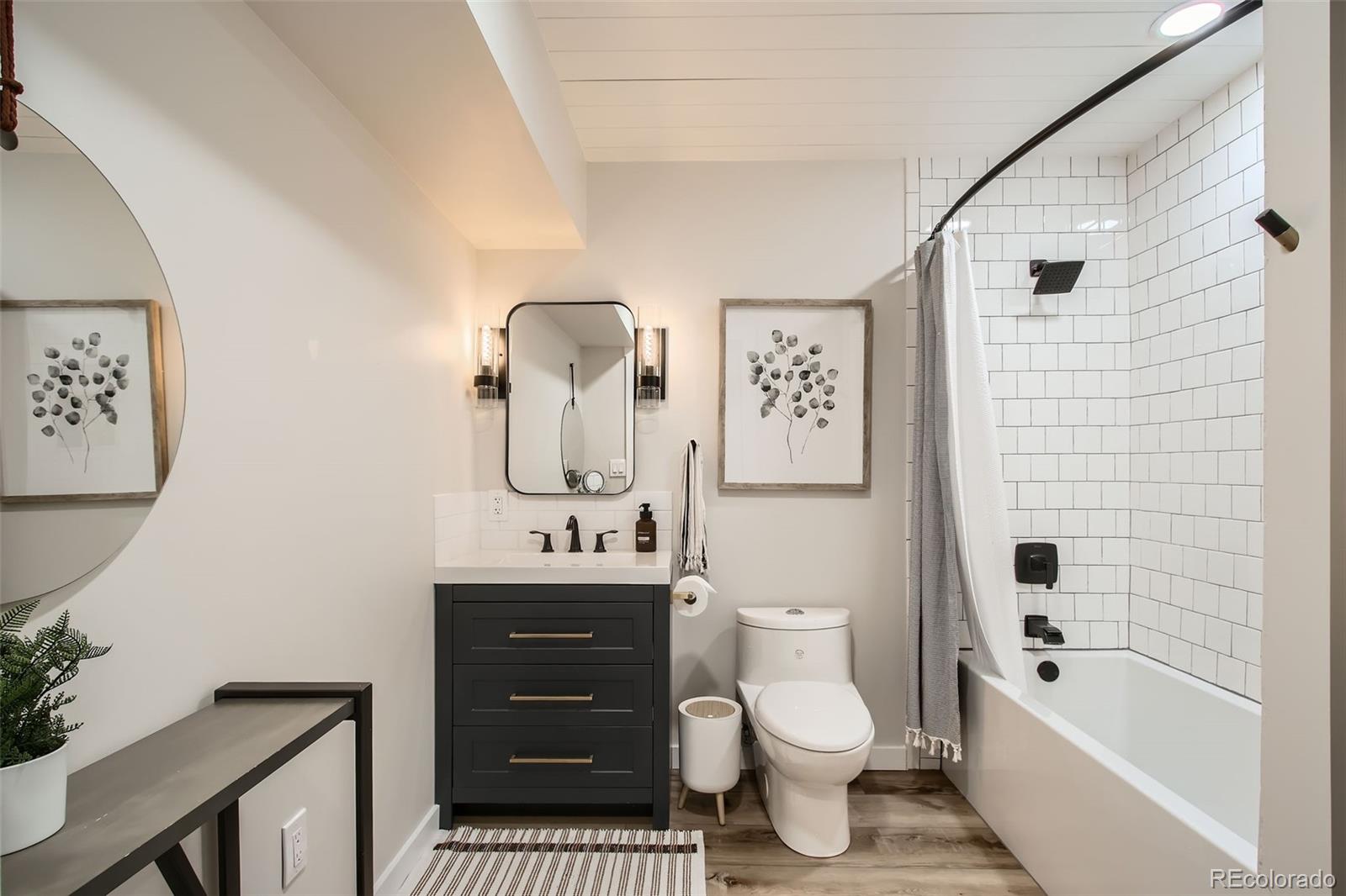 16626 Ouray Road West Pine, CO 80470 - Photo 31 of 50 a bathroom with a toilet a sink and bathtub