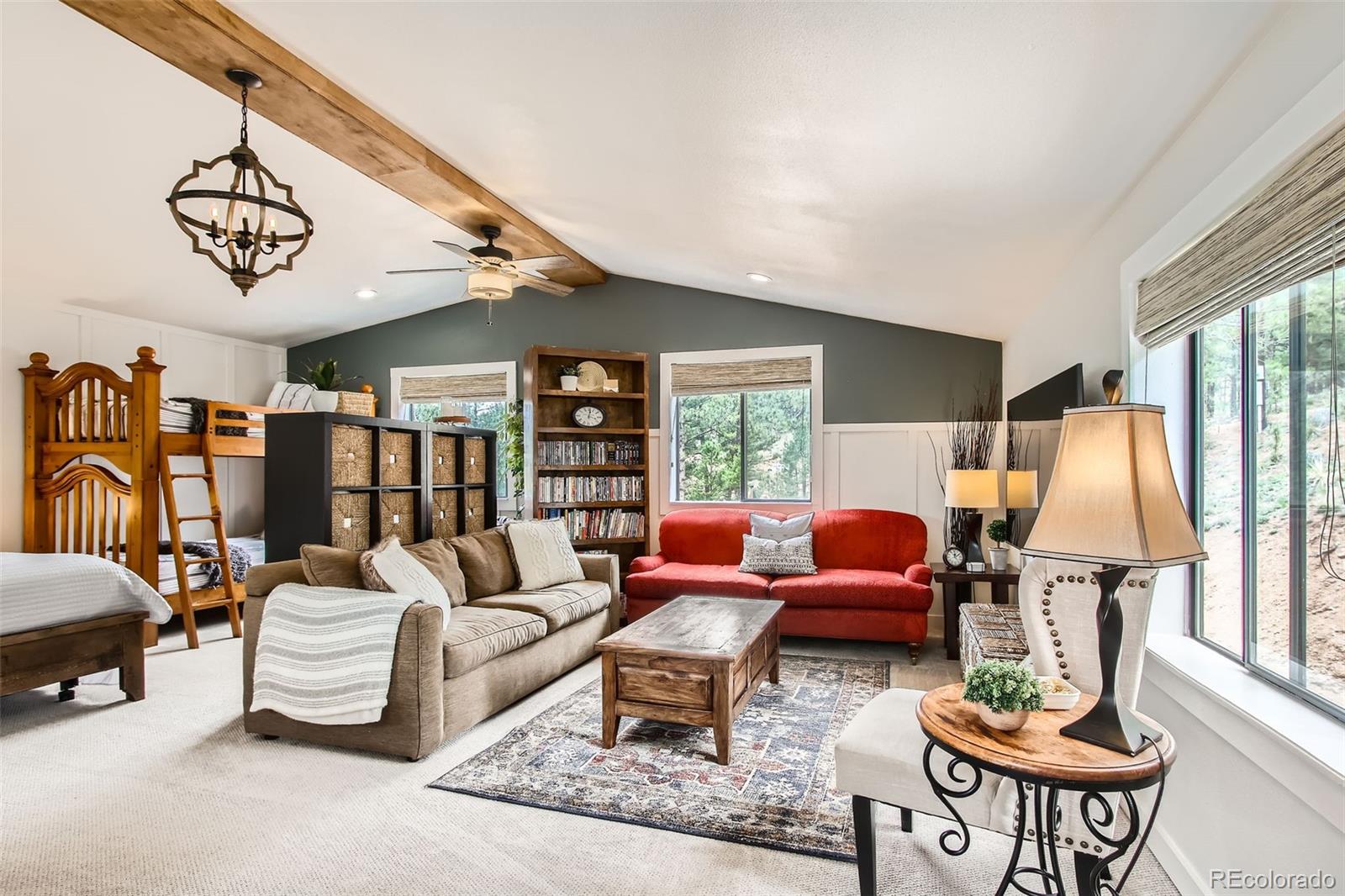 16626 Ouray Road West Pine, CO 80470 - Photo 32 of 50 a living room with furniture and a large window