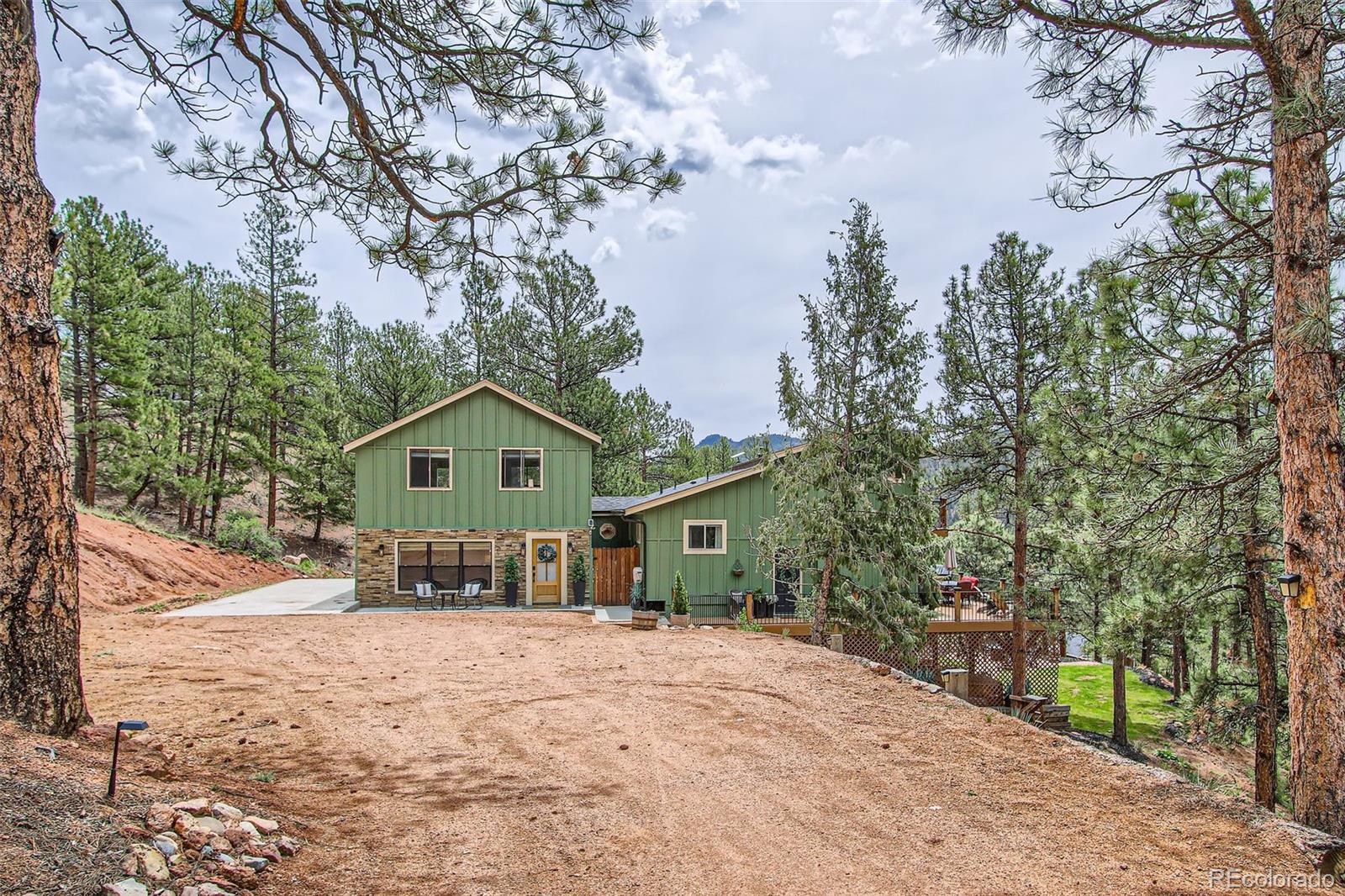 16626 Ouray Road West Pine, CO 80470 - Photo 37 of 50 a house with trees in the background