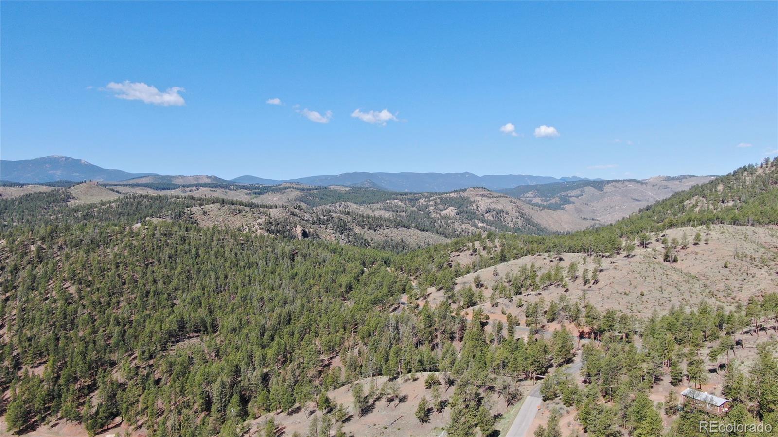 16626 Ouray Road West Pine, CO 80470 - Photo 48 of 50 a view of a city with mountains in the background
