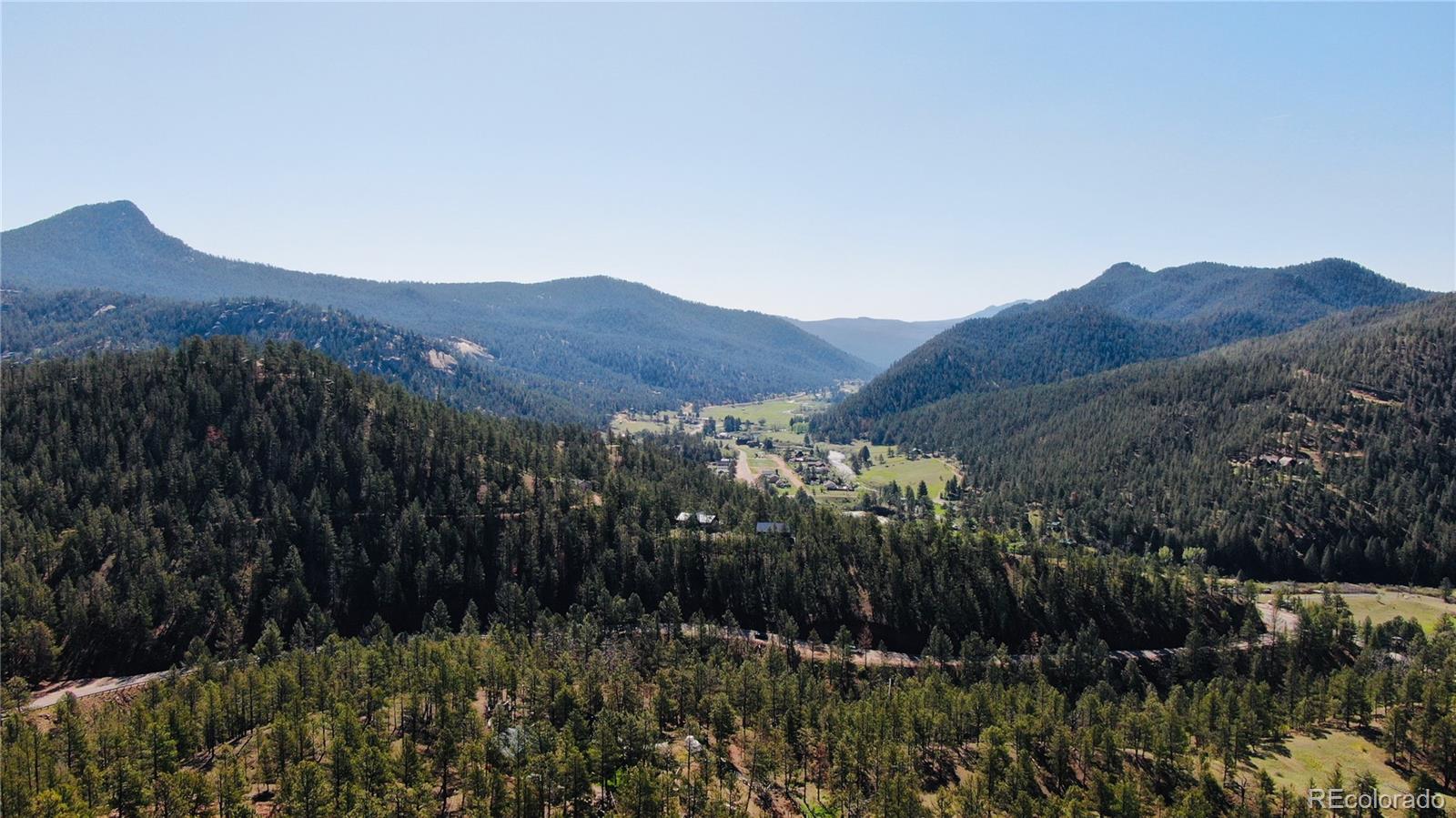 16626 Ouray Road West Pine, CO 80470 - Photo 50 of 50 a view of a house with a mountain in the background