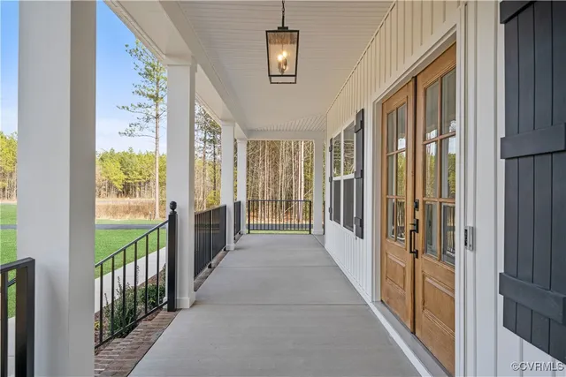 a view of a hallway with windows