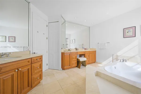 a room with a sink cabinets and utility room
