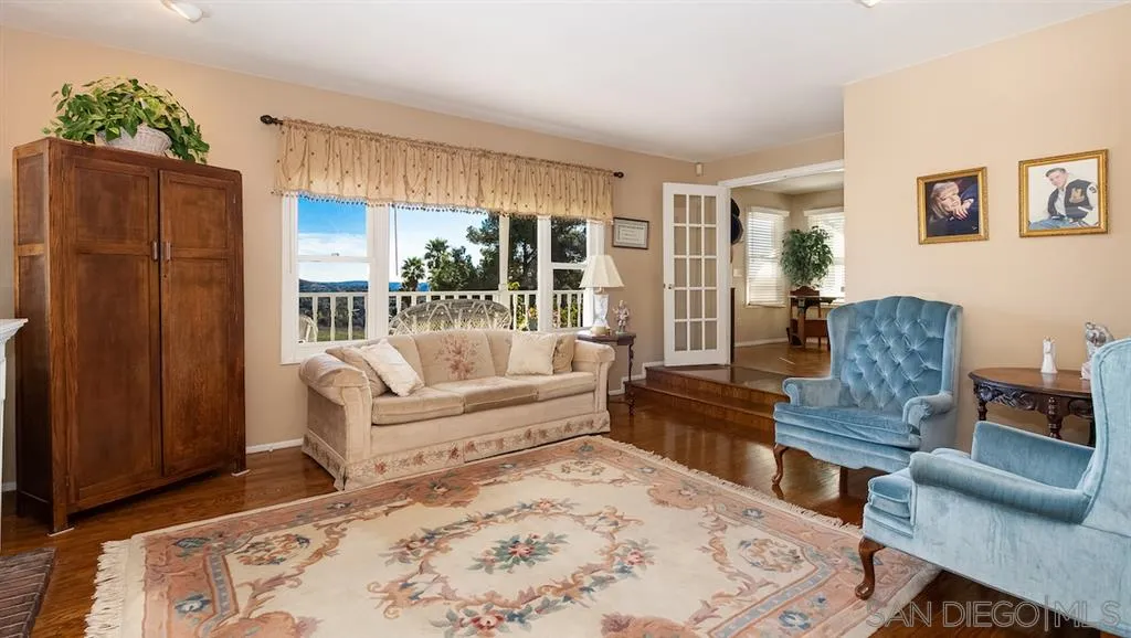 2444 Crestview Estates Place Escondido, CA 92027 - Photo 12 of 25 a living room with furniture and a large window