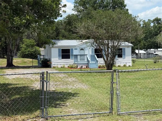 a front view of house with yard