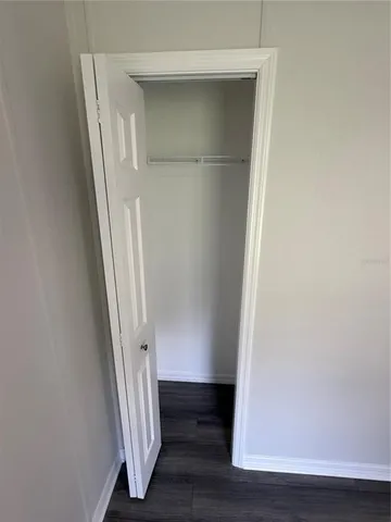 a view of front door with wooden floor