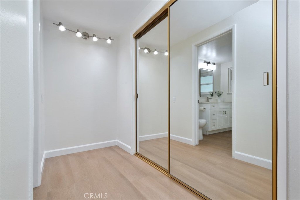 7006 Helmsdale Road West Hills, CA 91307 - Photo 26 of 41 Primary Bedroom Closet & Vanity Area