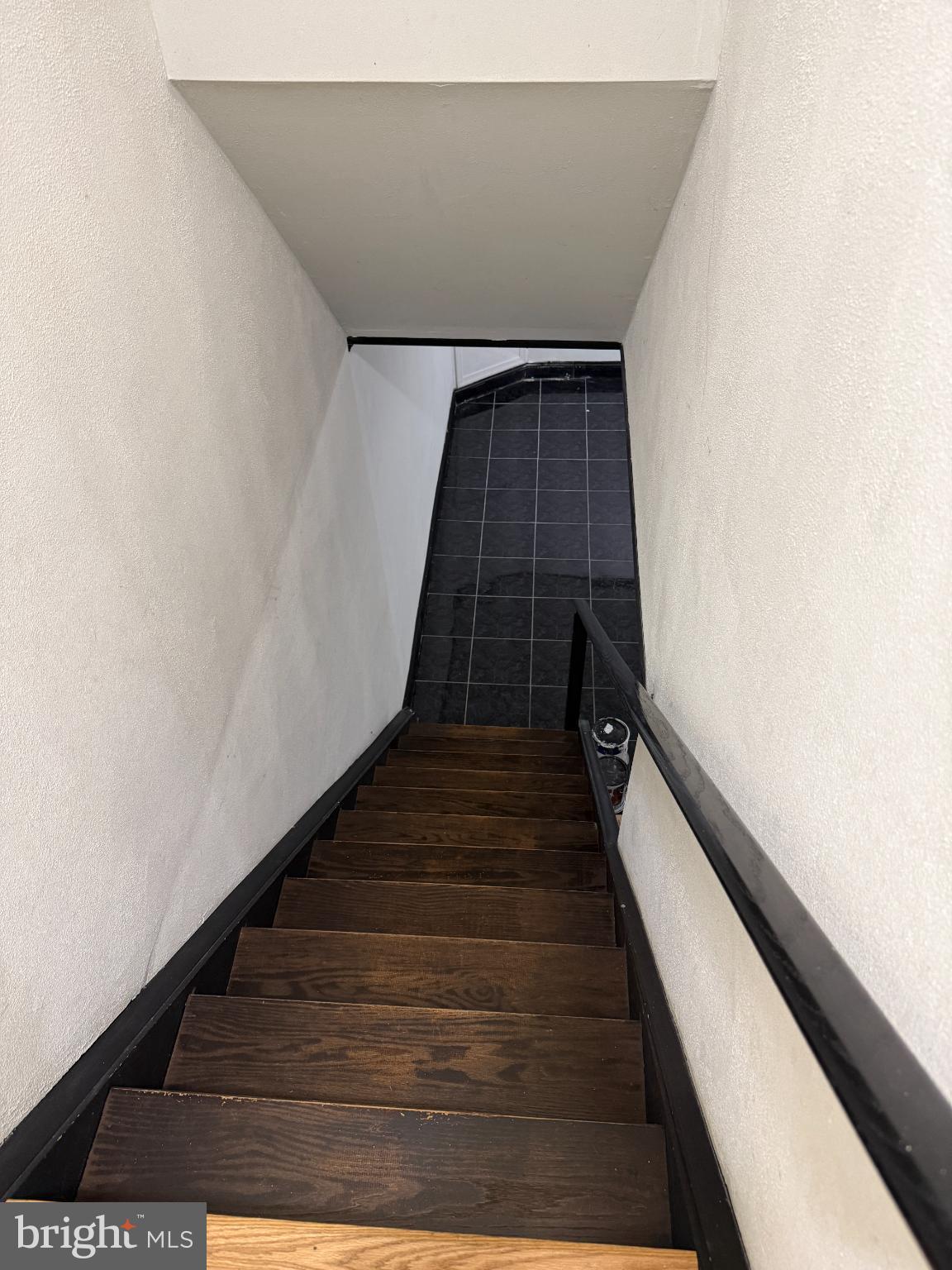 5107 Bay Road Bensalem, PA 19020 - Photo 20 of 23 Modern staircase leading to sleek tiles below.