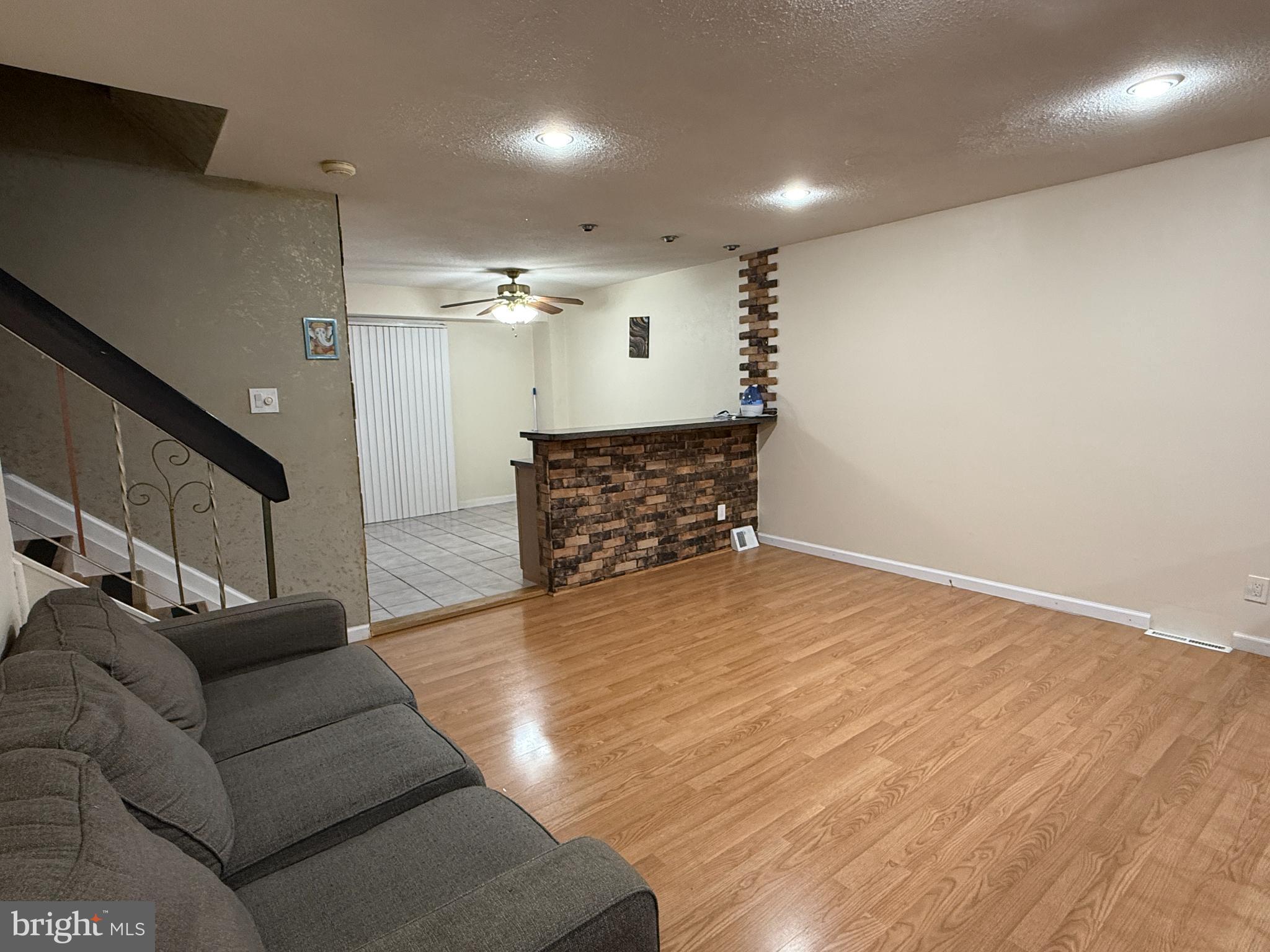 5107 Bay Road Bensalem, PA 19020 - Photo 5 of 23 Spacious living area with warm wood floors.