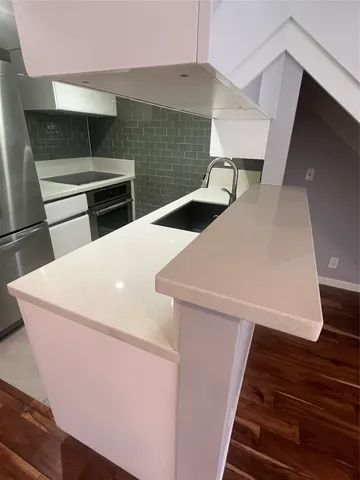 a utility room with washer and dryer