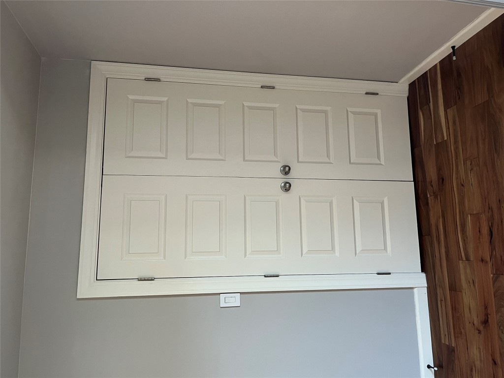 3110 Red River Street, Unit 216 Austin, TX 78705 - Photo 4 of 22 an empty room with wooden floor