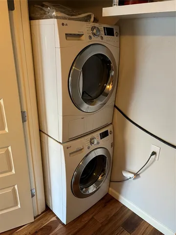 a view of a hallway with washer and dryer