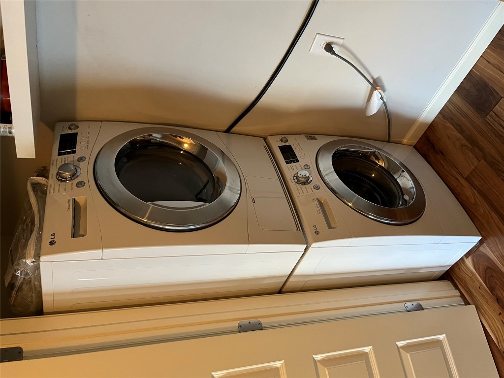 3110 Red River Street, Unit 216 Austin, TX 78705 - Photo 6 of 22 a view of a hallway with washer and dryer